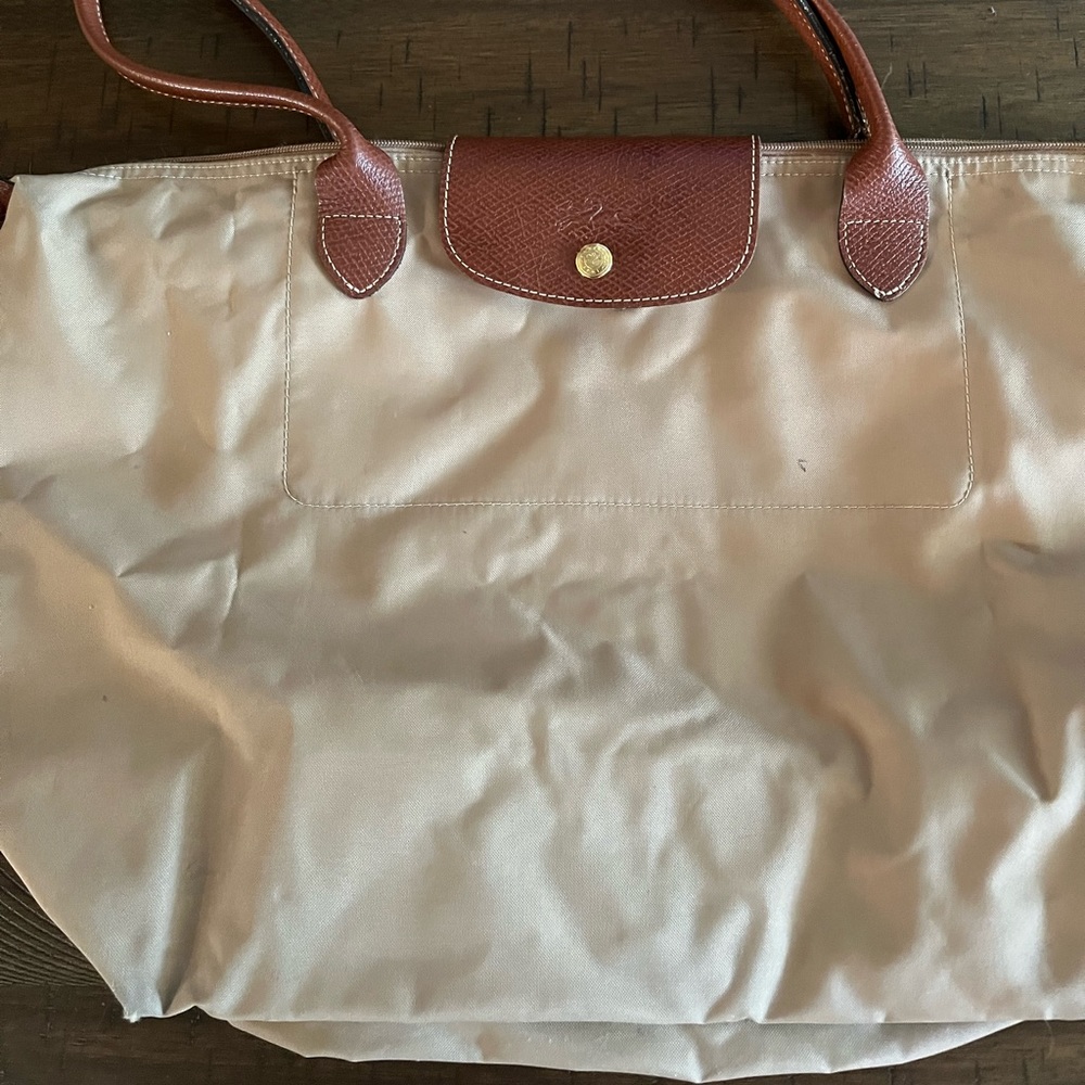Long champ tan and brown long handled packable tote.